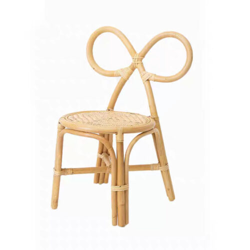 Front angle of colorful bow-back toddler chair made with Indonesian rattan