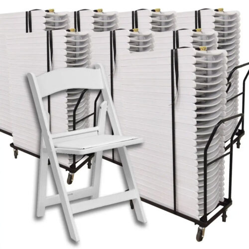 White resin folding wedding chairs stacked neatly for storage and transport