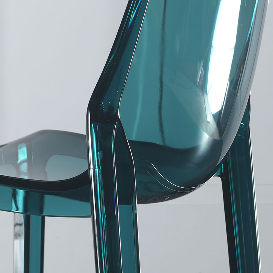 Close-up view of teal acrylic Nordic bar stool showing seamless molded backrest and ergonomic seat design