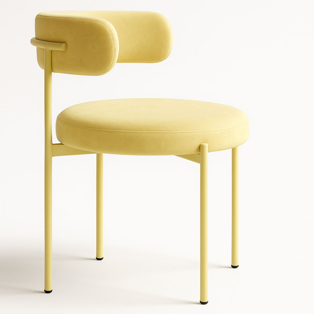 Side view of Aurora pastel yellow velvet dining chair with slim pastel frame and upholstered seating