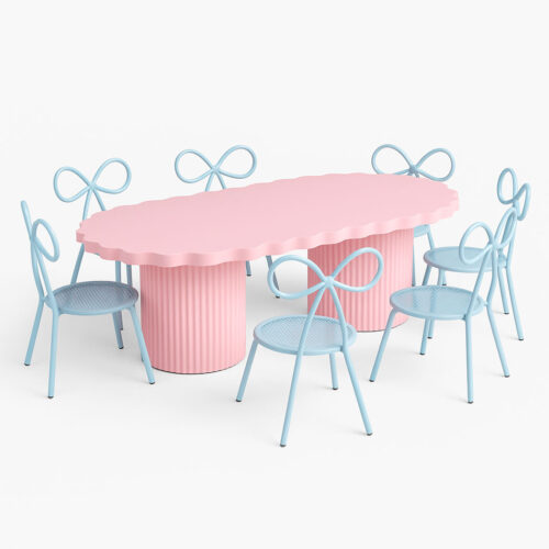 Pastel pink scallop-edge kids party table set with matching pink bow chairs